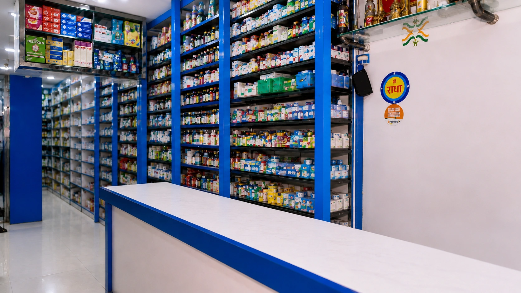 Inside Satyam Medical Agency, showing the dispensing counter and stocked shelves